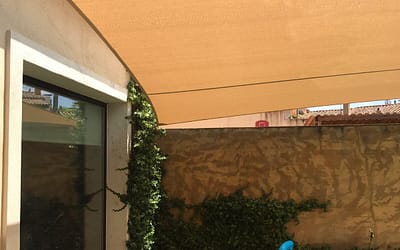 How much does a shade sail lower the temperature?